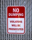 No dumping violators will be prosecuted sign