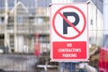 No entry or parking for contractors at building site entrance