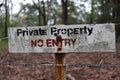 No entry private property sign in red, black and white in landscape Royalty Free Stock Photo