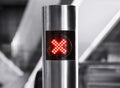 No entry sign cross digital light on stainless pole