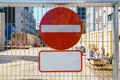 No entry sign on the fence in construction site of new apartment building in city, access is prohibited. Copy space for Royalty Free Stock Photo