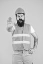 No entry. Stop. Dangerous zone. Man engineer protective uniform stop you. Architect builder engineer. Protective apparel
