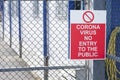 No entry to the public coronavirus covid-19 safety sign at place of work factory entrance Royalty Free Stock Photo