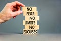No fear limits excuses symbol. Concept words No fear no limits no excuses on wooden blocks. Beautiful grey table grey background.