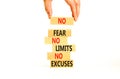 No fear limits excuses symbol. Concept words No fear no limits no excuses on wooden blocks. Beautiful white background.
