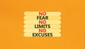 No fear limits excuses symbol. Concept words No fear no limits no excuses on wooden stick. Beautiful orange table orange