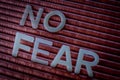 No Fear Motivation Concept. Word written with letters on a striped background Royalty Free Stock Photo