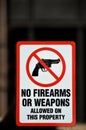 No Firearms or Weapons Allowed Sign