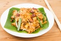 No frills simple Chinese Char Kway Teow or Fried Noodle on banana leaf