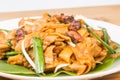 No frills simple Chinese Char Kway Teow or Fried Noodle on banana leaf