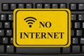 No Internet message on a sign on a computer keyboard