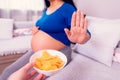 No junk food during pregnancy, maternity. Royalty Free Stock Photo