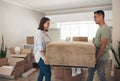 No landlord to tell us we cant move our things around. a couple moving furniture in their new home. Royalty Free Stock Photo