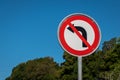 No left turn sign against blue sky. Traffic signs. Prohibited from turning left Royalty Free Stock Photo