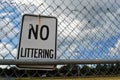 No Littering Sign on Fence