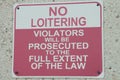 no loitering violators will be prosecuted to the full extent of the law writing. p