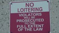 no loitering violators will be prosecuted to the full extent of the law writing