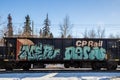 Graffitied rail car on the tracks. Calgary Alberta Canada