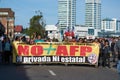 `No More AFP`. Chilean people in a massive protest at Puerto Montt. Protesters with chilean flag