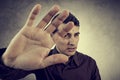 Portrait of a young man with raised hand making No more gesture Royalty Free Stock Photo