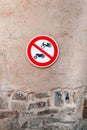 No motorcycle prohibition traffic sign attached to a wall outdoor Royalty Free Stock Photo