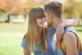 No one else in the world...a young couple sharing a tender moment together while enjoying a day in the park. Royalty Free Stock Photo