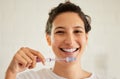 No one ever regrets taking good care of their teeth. Shot of a young woman brushing her teeth. Royalty Free Stock Photo