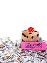 No one loves making financial mistakes and gambling with wrong information. Dice over scattered money. Royalty Free Stock Photo