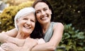 No other love comes closer. a happy senior woman spending quality time with her daughter outdoors. Royalty Free Stock Photo