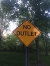 No Outlet yellow sign with black border, street sign