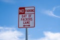 No Parking - Day of Packers Game, sign near Lambeau Field, home of the Green Bay Packers NFL team Royalty Free Stock Photo