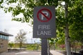 No Parking - Fire Lane sign preventing cars from blocking emegency exits