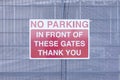 No parking in front of gates sign