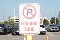 no parking loading zone rectangle vertical white red black sign with p crossed 106 p 17