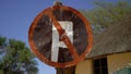 No Parking. Old rusty iron road sign. Abandoned road in the desert in Africa. Royalty Free Stock Photo