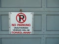 No parking sign affixed to a door
