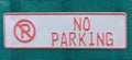 No parking sign on blue woven fabric.