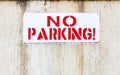 No parking sign. Private zone. Please do not leave you car here. Road up. Do not enter. Road signs. Red letters.