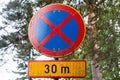 No parking or stopping 30 meters road sign in Finland Royalty Free Stock Photo