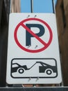 No parking and towing zone sign