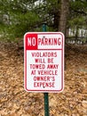 No parking violators will be towed sign