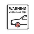 No parking warning sign with car clamped wheel - clamp