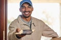 No pen required. Cropped portrait of a handsome young man delivering your package.