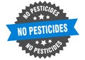 no pesticides sign. no pesticides round isolated ribbon label.