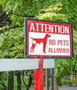 No pets allowed sign on gate in the park Royalty Free Stock Photo