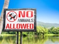 No pets allowed sign on gate in the park Royalty Free Stock Photo