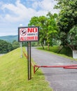 no pets allowed sign in the park Royalty Free Stock Photo