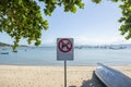 No pets allowed signal at the beach. Dogs prohibited. Sign that prohibited domestic animal from entering the beach. Red sign dog