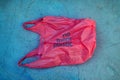 No plastic. Environmental awareness. Red plastic garbage bag with motto