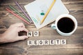 No Regrets. Wooden letters on the office desk Royalty Free Stock Photo